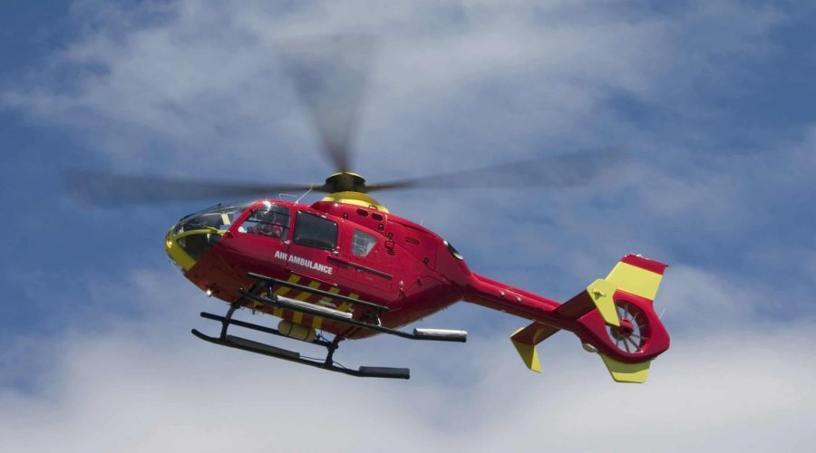 Air,Ambulance,In,Flight,Hovering,Attending,Emergency Air ambulance in flight